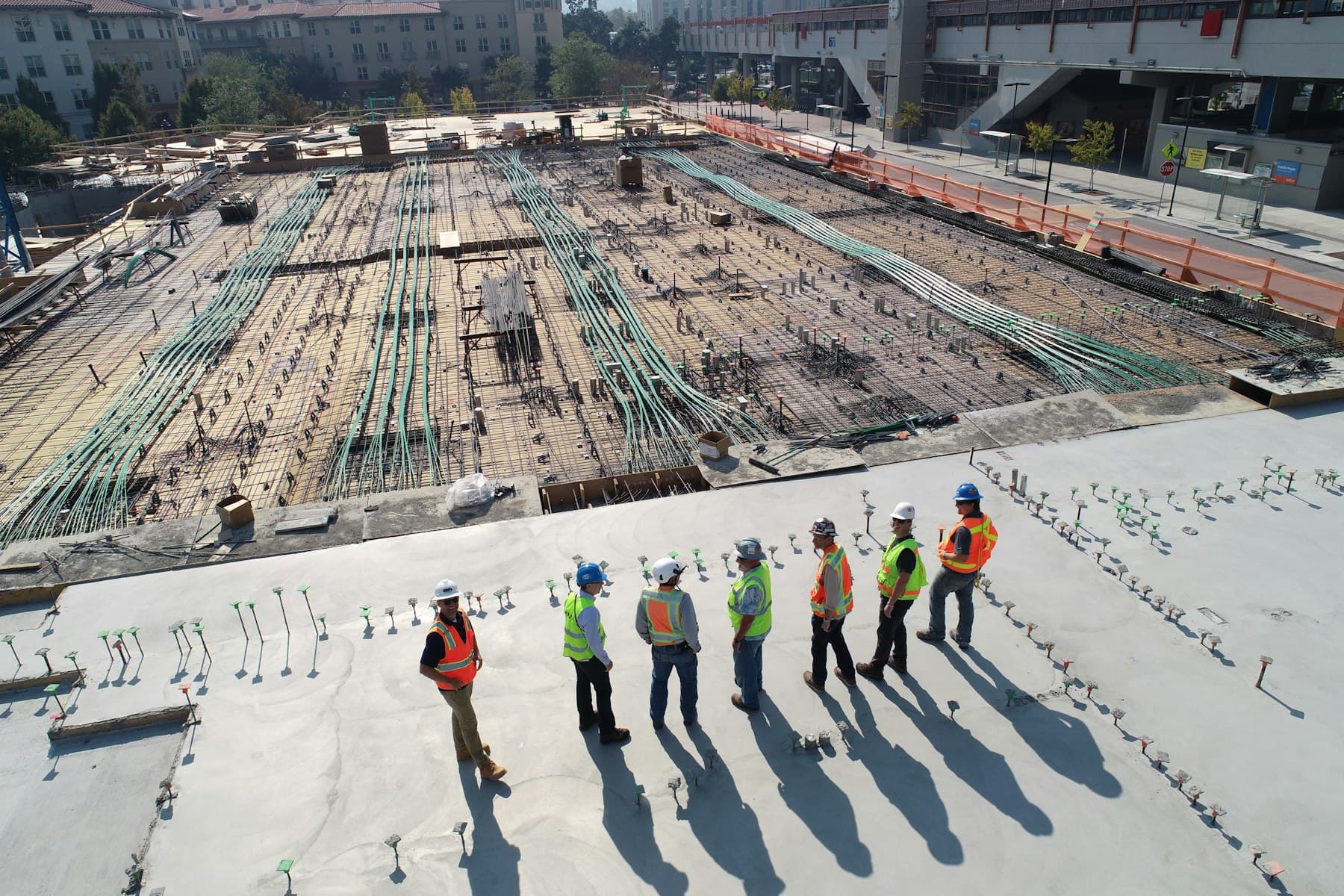 Construction crew in hard hats on a building site